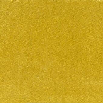 Mustard yellow woven fabric texture with a granular surface, displaying a dense, uniform weave and matte finish; label reads “ditre italia.”